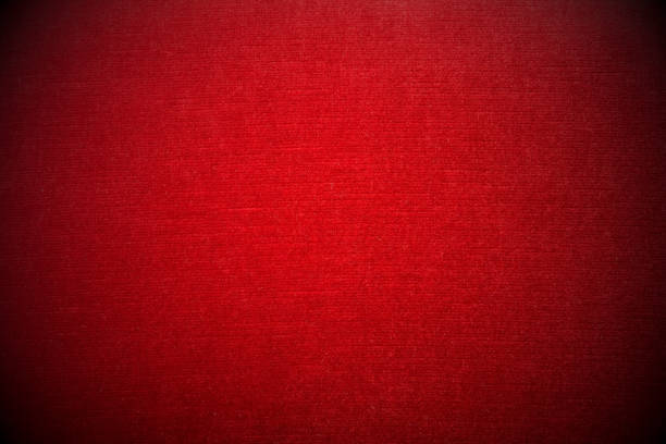 istock Close-up of red velvet sofa - vignetting effect - background 1153796337