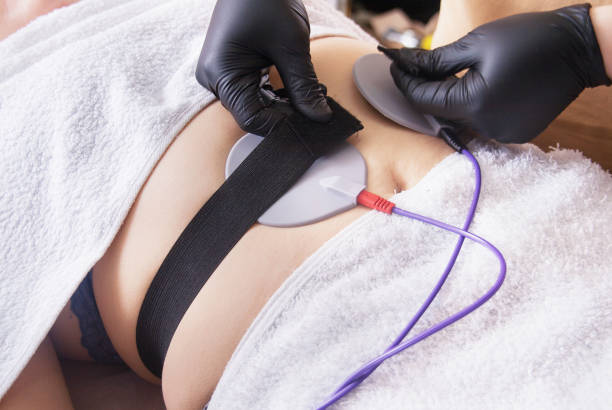 myostimulation pour la zone abdominale. appareil cosmétologie pour la peau et la perte de poids. - alternative medicine audio photos et images de collection