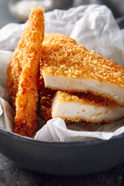 istock Hot Fried Crispy Chicken Fillet on Black Background with Different Sauces and Spices 1153798362