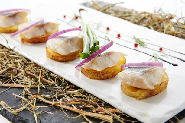istock Herring Fillet Canape with Potato and Onion 1153798443