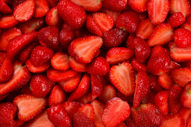 istock Strawberry slices. Fresh berries macro. Fruit background. Top view. 1153798781