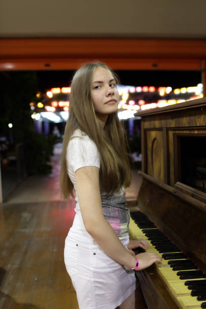 istock Teen with piano 1153803398