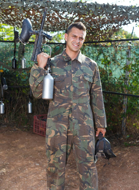 istock Male paintball player ready for game 1153803971