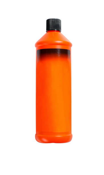 istock Cleaning product in orange plastic bottle 1153805255
