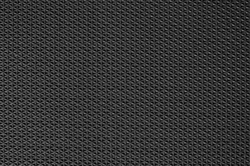 Black rubber texture background with seamless pattern.