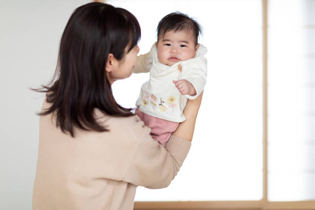 istock She comforted the baby by holding her. 1153816758
