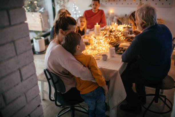 istock Christmas dinner with family 1153817970