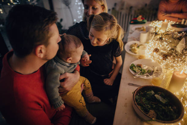 istock Baby's first Christmas with family 1153818560