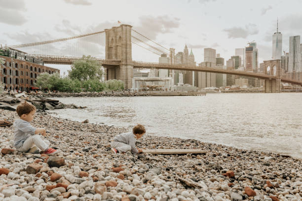 Boys playing in the Brooklyn Bridge Park, New York