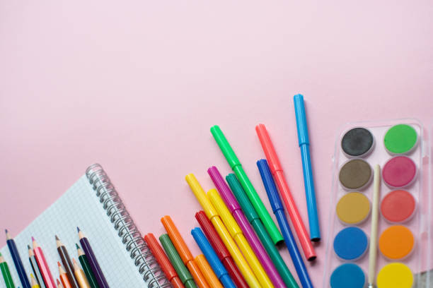 istock School supplies lay on pink background, back to school concept, copy space 1153825391
