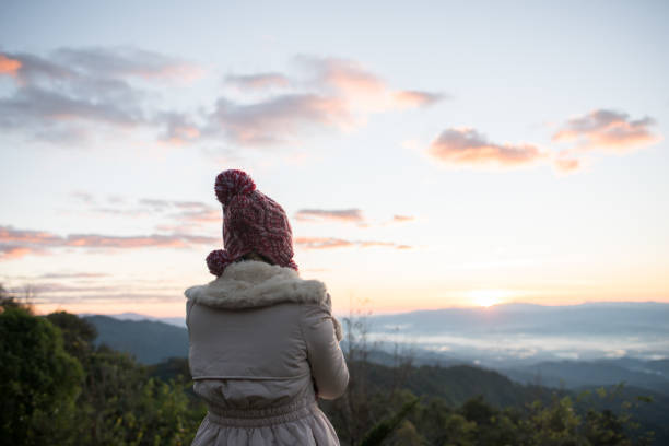 istock Woman wake up relax in morning on th mountain 1153826450