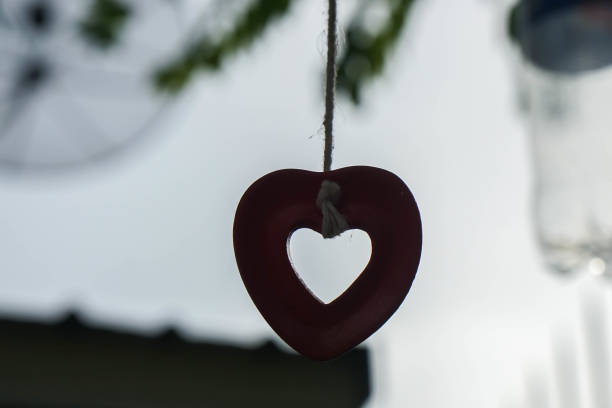 silhouette hanging mobile in heart shape