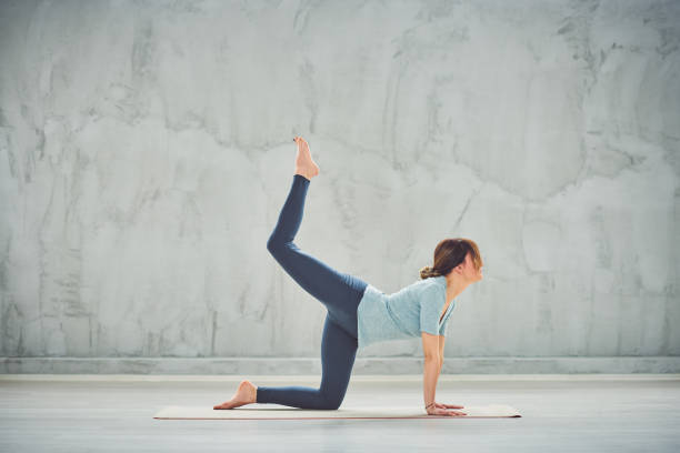istock Woman doing yoga. 1153833226