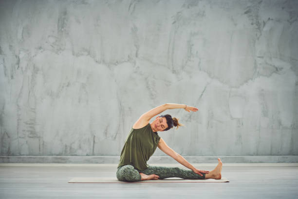 istock Woman doing yoga. 1153835132