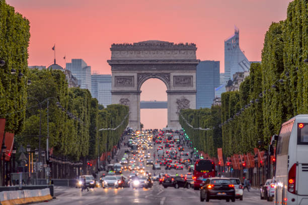 istock Champs Elysees and the Arc de Triomphe During a Pink Sunset 1153835449