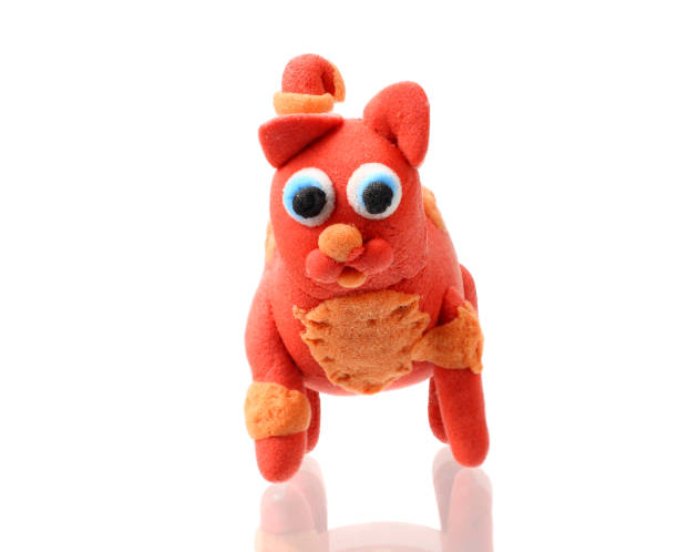 istock plasticine cat isolated on white background. modelling clay 1153838303