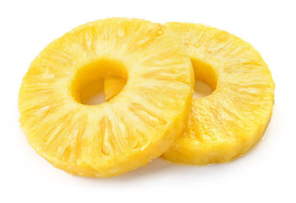 istock Pineapple rings. Canned pineapple slices isolated on white. 1153839364