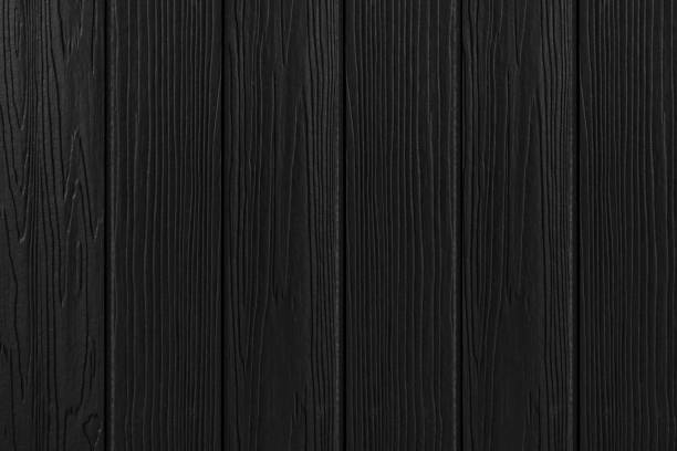 istock Black wood wall texture and background 1153839625