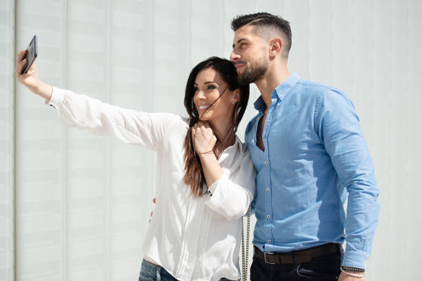 istock A Young And Smiling Couple Takes A Selfie 1153841892