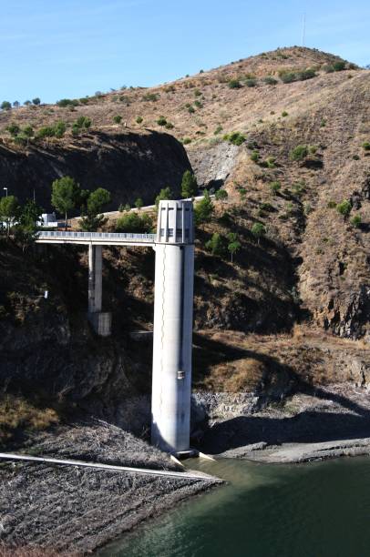 istock Tower on edge of reservoir, Malaga, Spain. 1153844471