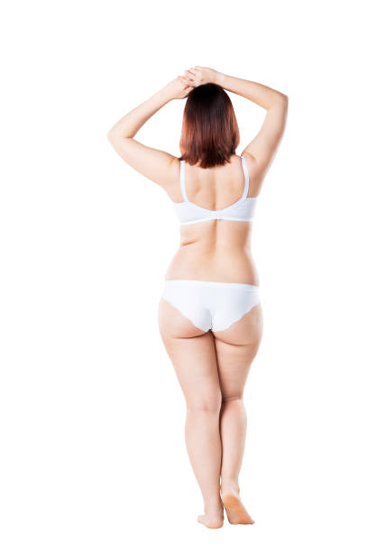 fet kvinna i underkläder isolerade på vit bakgrund, celluliter på kvinnlig kropp - kvinna stor rumpa bildbanksfoton och bilder