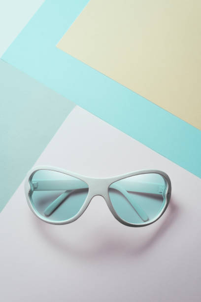 istock sunglasses on pastel multicolor paper trendy background. Minimal concept 1153847008