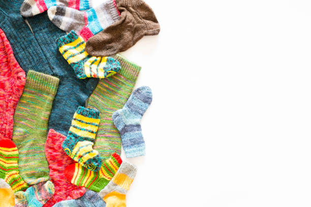 Colorful woolen socks on white background stock photo
