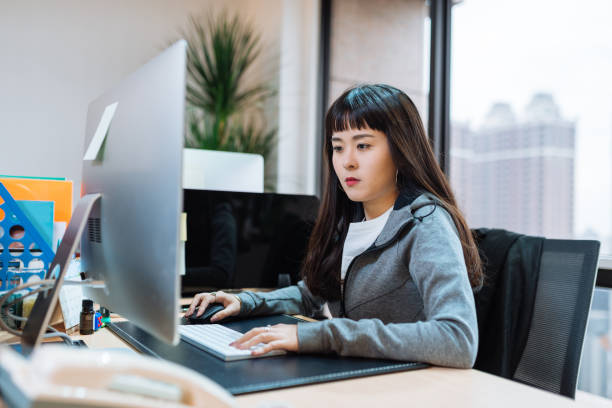 istock Millennial investor in Taiwan or China, working on online platform. 1153851821