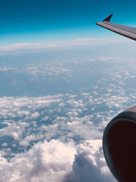 istock Airplane wing as seen from the passenger's seat. 1153852184