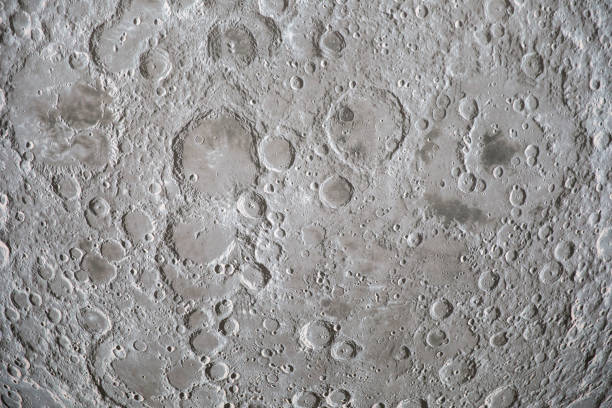 istock Astronomy illuminated Moon or planet showing surface and craters 1153855414