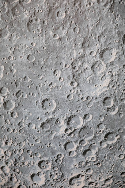 istock Astronomy illuminated Moon or planet showing surface and craters 1153855462