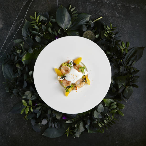 istock Exquisite Serving Tiger Shrimps with Avocado Top View 1153856157