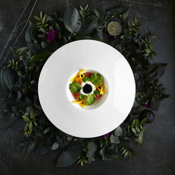 istock Stracciatella with Pickled in Olive Oil Tomatoes, Basil Marmalade and Cream 1153856189