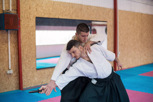 istock Professional fighters in a gym 1153856652