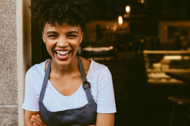 istock Cafe owner standing in the doorway 1153859229