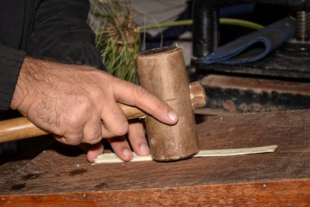 istock Hand craft of making a papyrus paper 1153859523