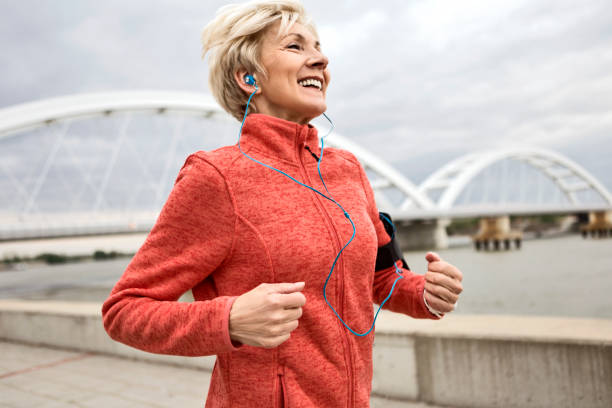 istock Athletic senior woman running 1153860849
