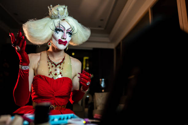 istock Man drag queen looking in the mirror 1153862695