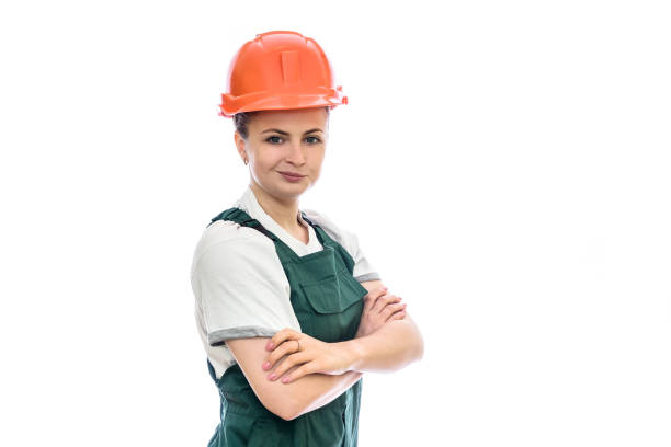 istock Woman builder in helmet isolated on white 1153863166