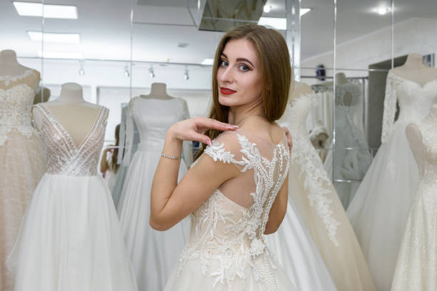 istock Back view at beautiful bride in salon 1153865662