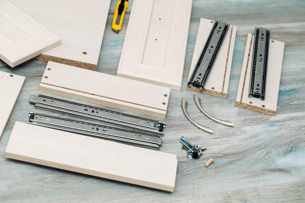 istock Assembling the bedside table, tools and materials, full extension Ball guides and wooden sides 1153868418