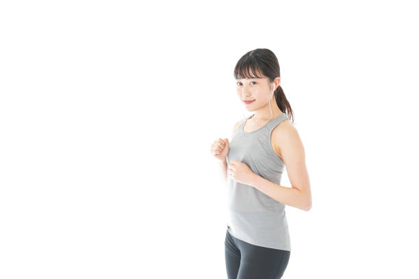 istock Young woman running 1153870200