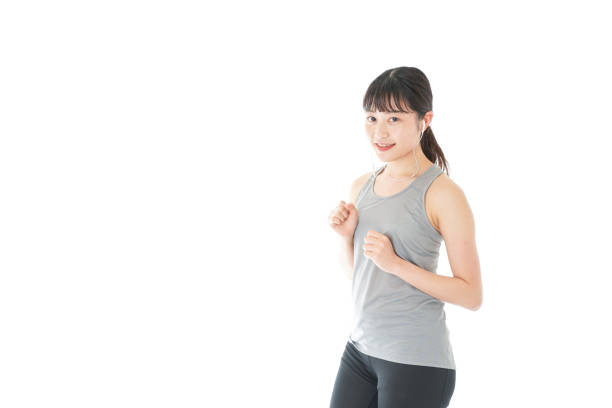 istock Young woman running 1153870201