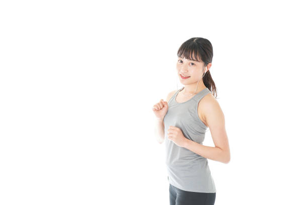istock Young woman running 1153870221