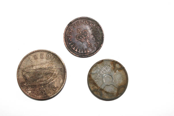 istock Vintage Old Money Coins On White Background 1153870965
