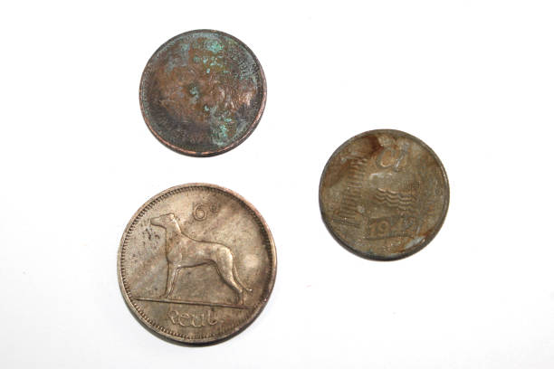 istock Vintage Old Money Coins On White Background 1153870971