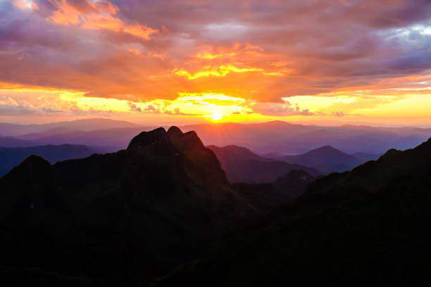 istock Silhouette sunset on mountain with colorful sky cloud 1153870981