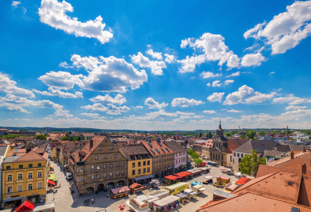 Historic city center of and pedestrian zone of Bayreuth Aerial view over the historic city center and pedestrian zone (Maximiliansrasse) of Bayreuth on a beautiful summer day bayreuth stock pictures, royalty-free photos & images
