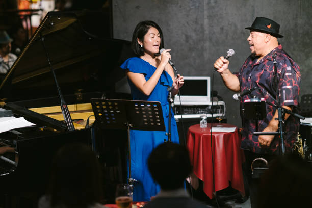 istock Multi-ethnic jazz music group performing at stage 1153872378