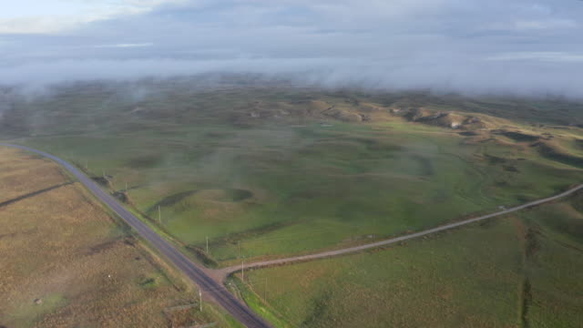 foggy morning over Nebraska Sandhills, aerial view